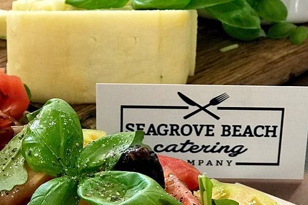 cheese and produce with catering signage