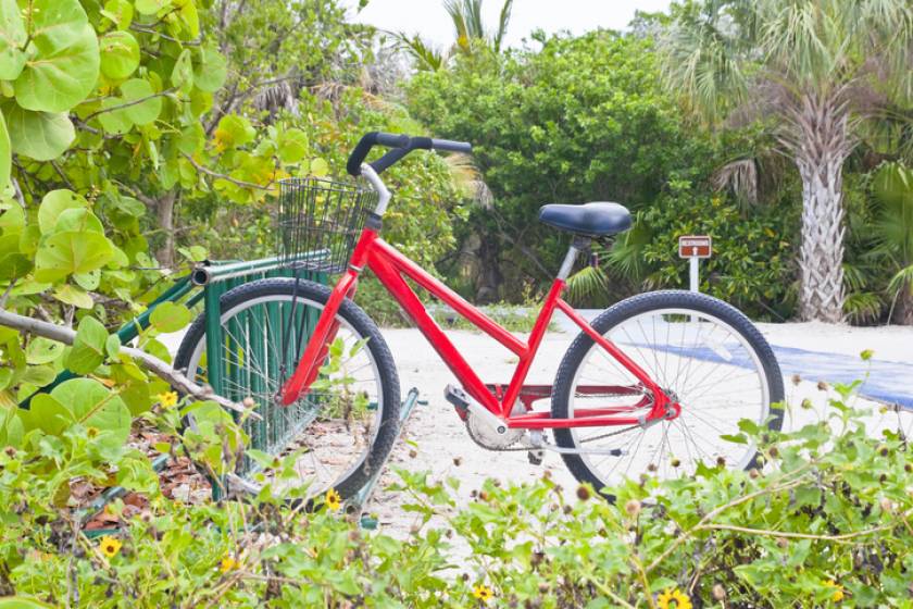 Red bicycle in bike rack