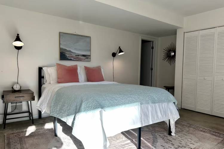Pictured: Queen bed and nightstands in Happy Hoos