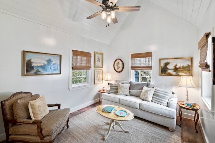 Pictured: the living room with a lofted ceiling at Somerset Cottage