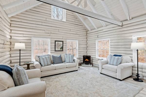 white farmhouse style living room with large rug
