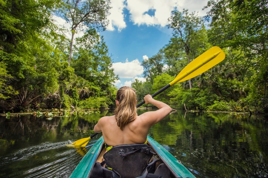 Woman-Kayaking The Great Calusa Blueway Paddling Trail