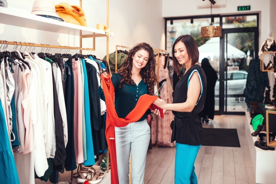 Two Women shopping for clothes The Village Shops