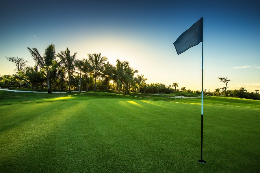 Tropical-Golf-Course-at-sunset The Sanctuary Golf Club