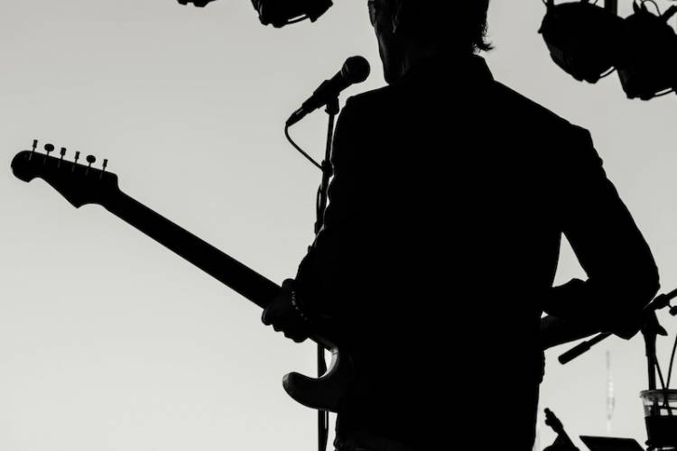 Band playing on stage at an outdoor concert