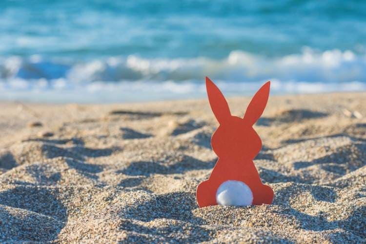 Easter bunny cutout in the sand