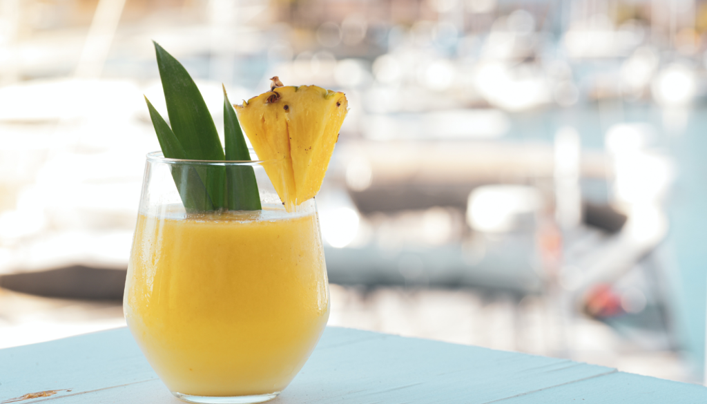 frozen drink with pineapple garnish