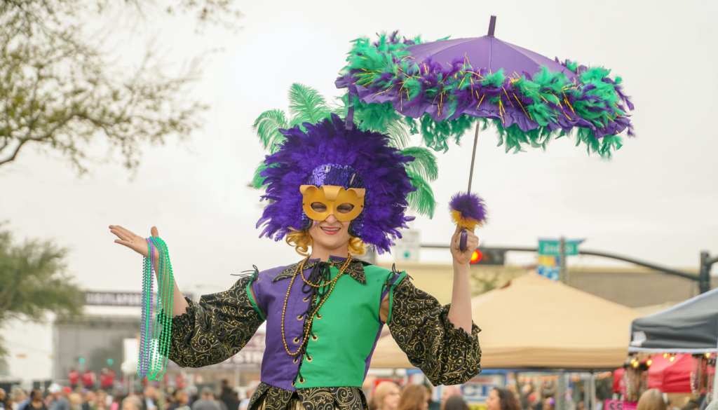 person dressed in costume for mobile mardis gras