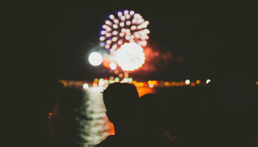 new year's eve fireworks display over the water