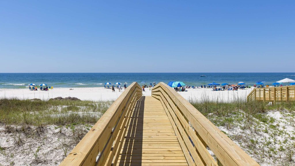 boardwalk to the beach at ocean edge, a luxury orange beach community