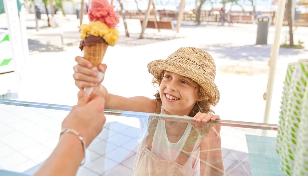 girl with ice cream during the summer in gulf shores