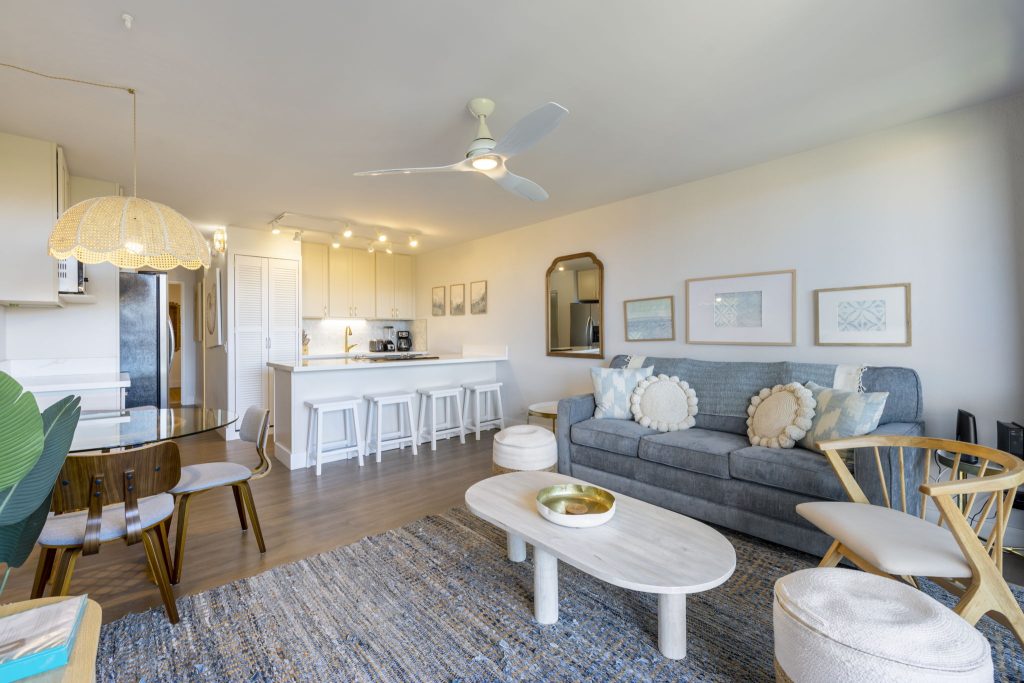 Open plan living room and kitchen in a Perch-managed Maui condo