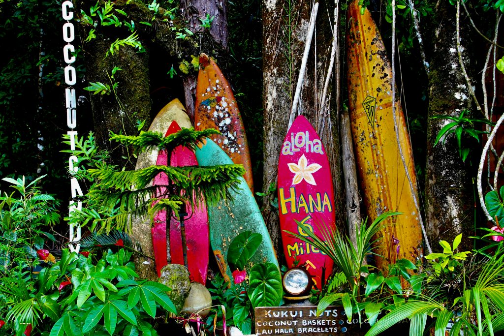 Painted surfboards marking a roadside stand on the Road to Hana