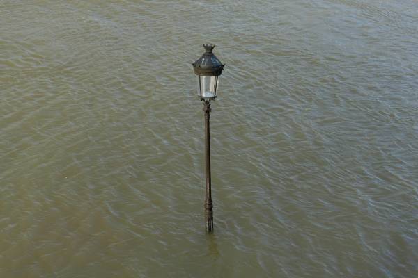 photo of flooded area with a single lamp post