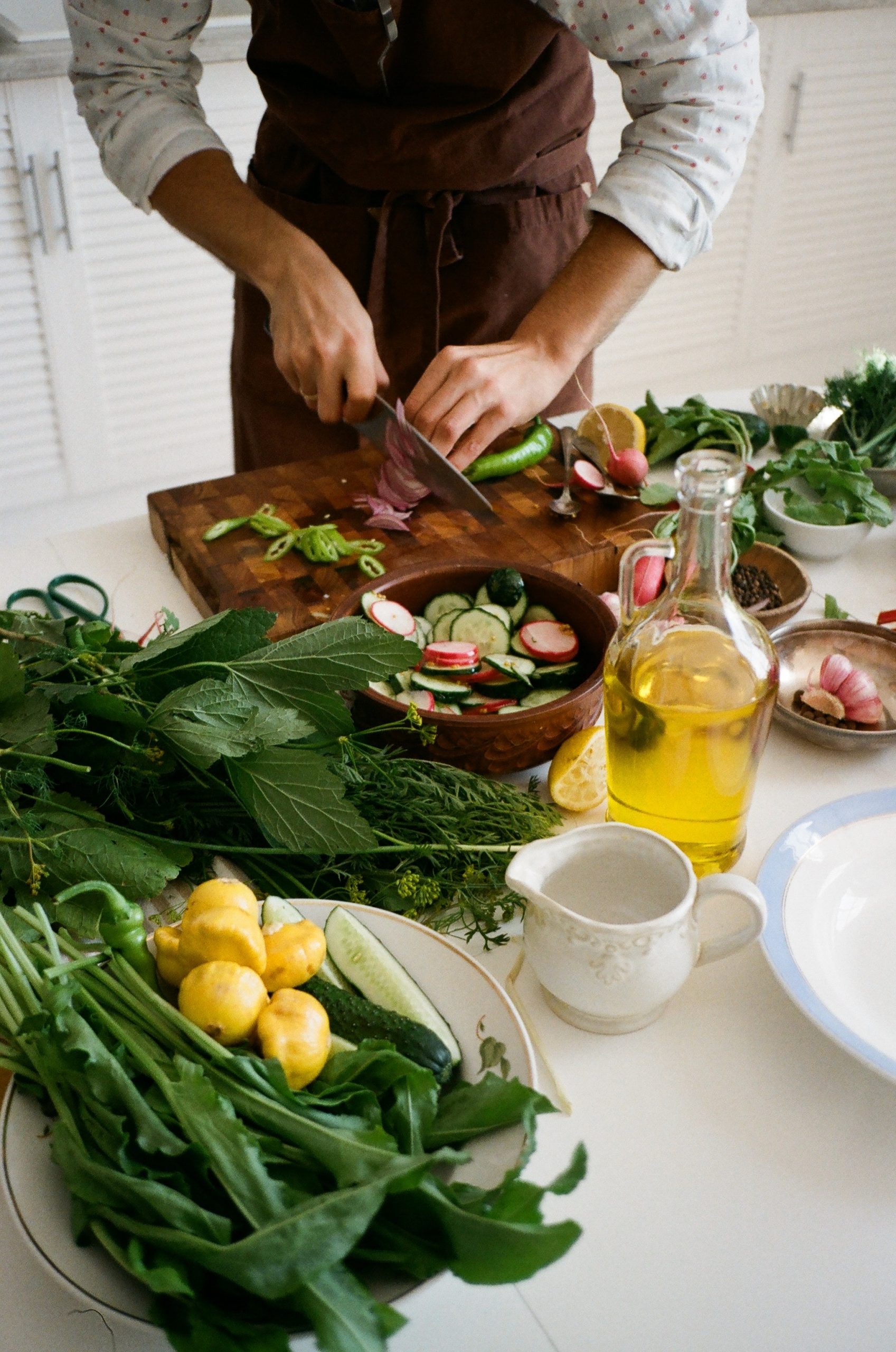 chef cuts vegetables