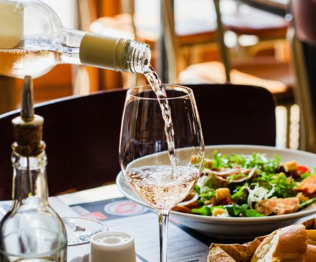 Dinner Table and Wine Pouring