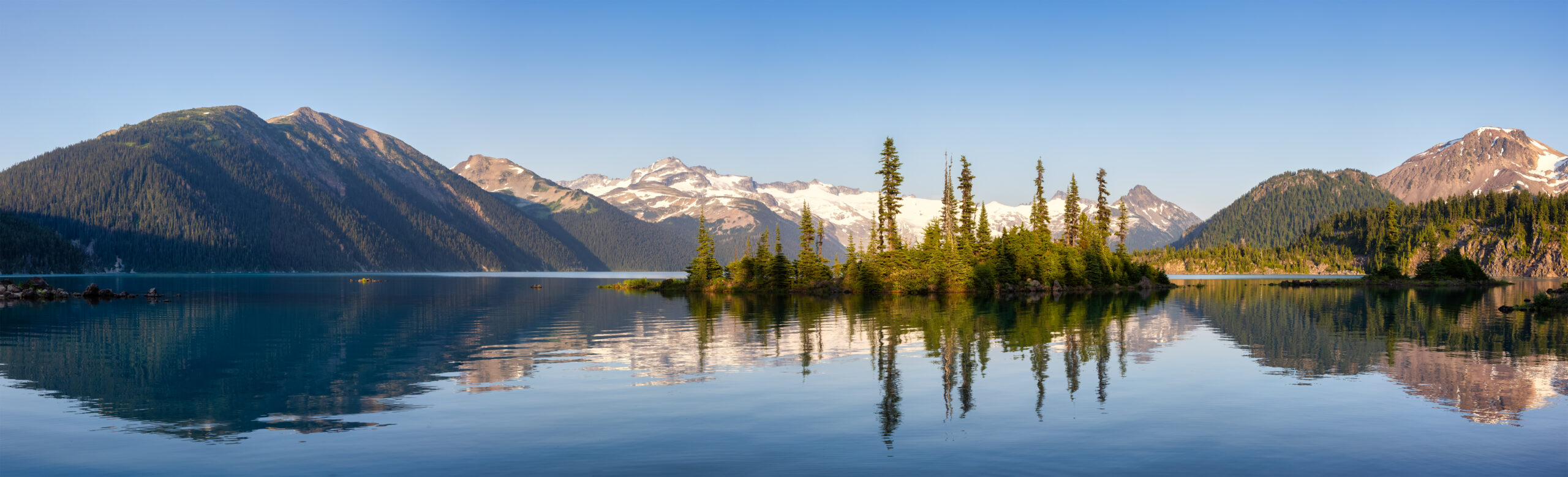 Whistler hiking trails surrounded by jagged peaks and turquoise lakes